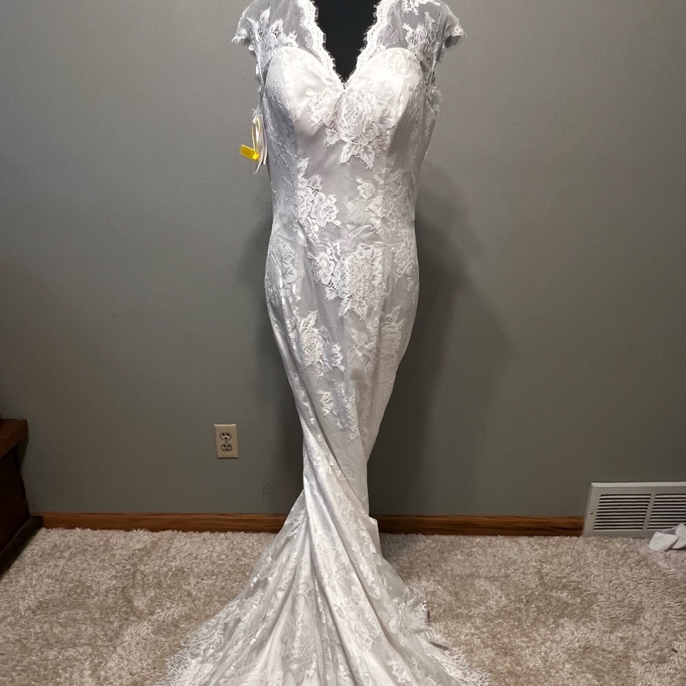 Wedding dress… ivory size 12 new